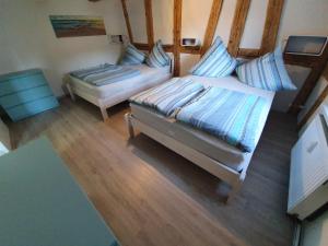 an overhead view of a bedroom with two beds at Apartment Happy Memories in Titisee-Neustadt