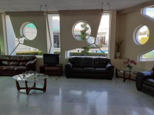 Posezení v ubytování Leo Hotel