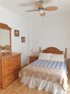 A bed or beds in a room at Riu Tolox