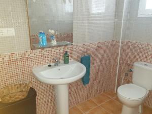 A bathroom at Riu Tolox