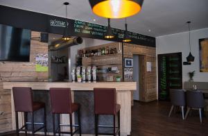 Lounge nebo bar v ubytování Hotel Garni Ilys Inn