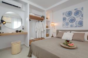 Sea & Olives Suites Hotel and Villas客房内的一张或多张床位
