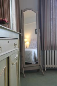 Postel nebo postele na pokoji v ubytování Hotel Hippocampus