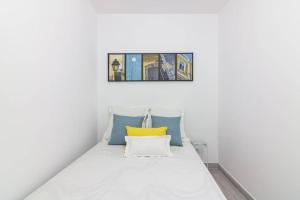 מיטה או מיטות בחדר ב-Casa Mino
