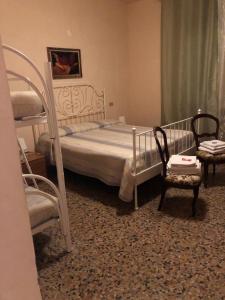 Postel nebo postele na pokoji v ubytování B&B Amelia + 15 fotografií