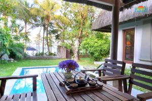 Ein Garten an der Unterkunft Sun Spa Resort & Villa