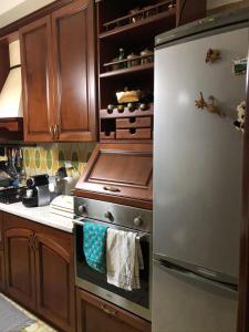 A kitchen or kitchenette at CAPO PELORO RELAX