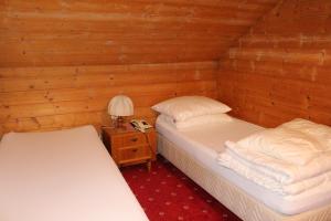 Voodi või voodid majutusasutuse Hotel Grafenwirt toas