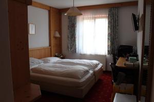 Voodi või voodid majutusasutuse Hotel Grafenwirt toas