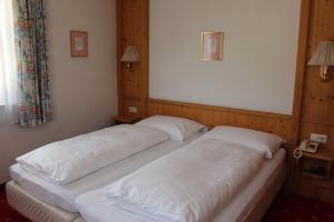 Voodi või voodid majutusasutuse Hotel Grafenwirt toas