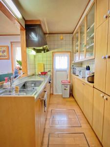 A cozinha ou kitchenette de 安野月江苑 Anno Gekkouen FUJI