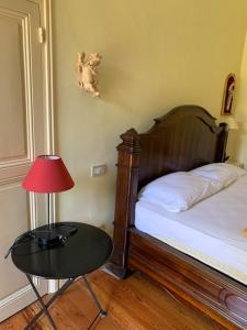 Ένα ή περισσότερα κρεβάτια σε δωμάτιο στο La Felice Casa Di Nonno Battistino