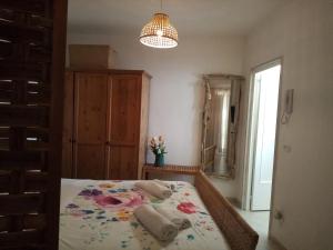 A bed or beds in a room at Sweet Home by Giò