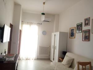 A seating area at Sweet Home by Giò
