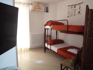 A bed or beds in a room at Sweet Home by Giò