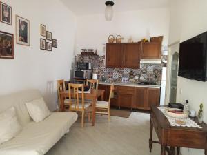 A kitchen or kitchenette at Sweet Home by Giò