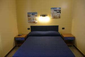 A bed or beds in a room at Il Gabbiano