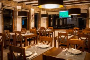 Um restaurante ou outro lugar para comer em Quinta das Oliveiras Turismo Rural