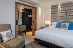 Postel nebo postele na pokoji v ubytování Orient by Isrotel Exclusive