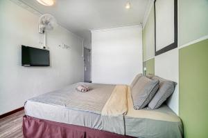 Postel nebo postele na pokoji v ubytování Parkland Express