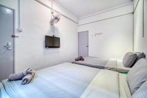 Postel nebo postele na pokoji v ubytování Parkland Express