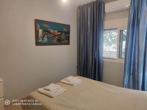 Katil atau katil-katil dalam bilik di Apartment Maxim
