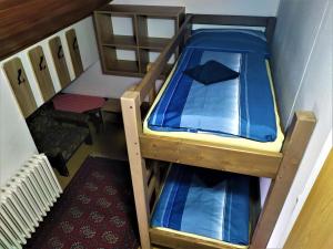Postel nebo postele na pokoji v ubytování Chata Šumná