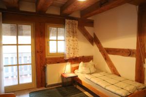 Ένα ή περισσότερα κρεβάτια σε δωμάτιο στο Gästehaus Roensch