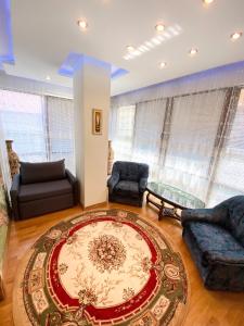 Posezení v ubytování Петрос Family Hotel