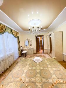 Postel nebo postele na pokoji v ubytování Петрос Family Hotel