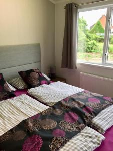Un pat sau paturi într-o cameră la Seegras