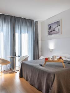 Voodi või voodid majutusasutuse Hotel Colle Del Sole toas