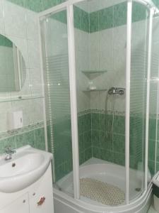 Kúpeľňa v ubytovaní Czerwonki Apartament