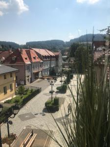 a view of a town with buildings and a street at Nokturn Apartament in Duszniki Zdrój