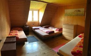 מיטה או מיטות בחדר ב-Chata Vrch Varta