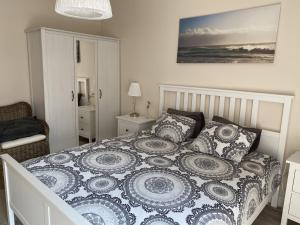 Postel nebo postele na pokoji v ubytování Apartamenty AMALIA