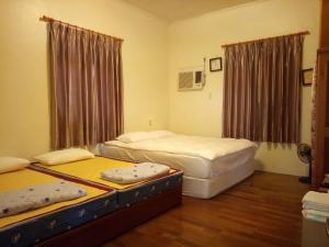 Malin 100 B&B Jiaoxiにあるベッド
