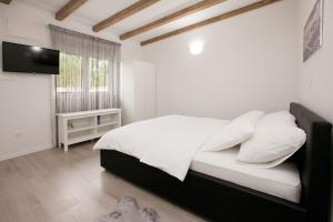 Posteľ alebo postele v izbe v ubytovaní Studio apartments Tara
