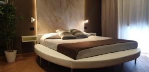 A bed or beds in a room at TH LUXURY fly