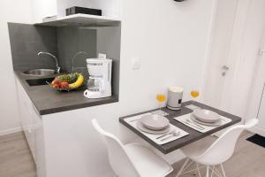 Kuchyňa alebo kuchynka v ubytovaní Studio apartments Tara