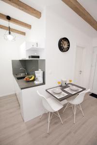 Kuchyňa alebo kuchynka v ubytovaní Studio apartments Tara