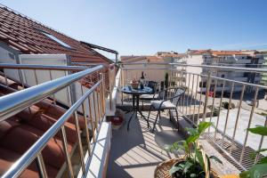 A balcony or terrace at Apartments Adriatic - Split Stobrec