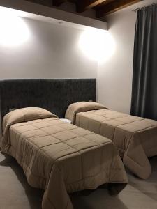 Posteľ alebo postele v izbe v ubytovaní Guest house Regina Margherita