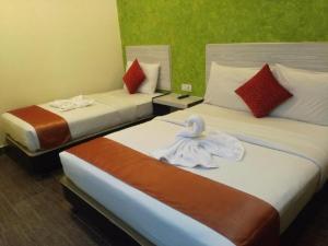 
Кровать или кровати в номере Hotel Westree KL Sentral
