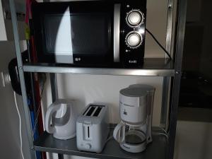 Kuchyň nebo kuchyňský kout v ubytování Appartement a la Campagne