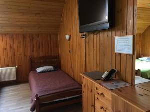 TV a/nebo společenská místnost v ubytování Guest House Eco home