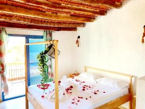 Postel nebo postele na pokoji v ubytování B&B La Nava Suites
