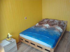 Postel nebo postele na pokoji v ubytování Anni Apartment