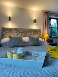 A bed or beds in a room at Sayang House 