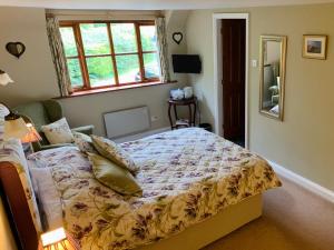 A bed or beds in a room at Sayang House 